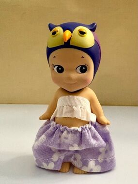 Owl from the Sonny Angel Animal V1 series in purple flowery pants and top!